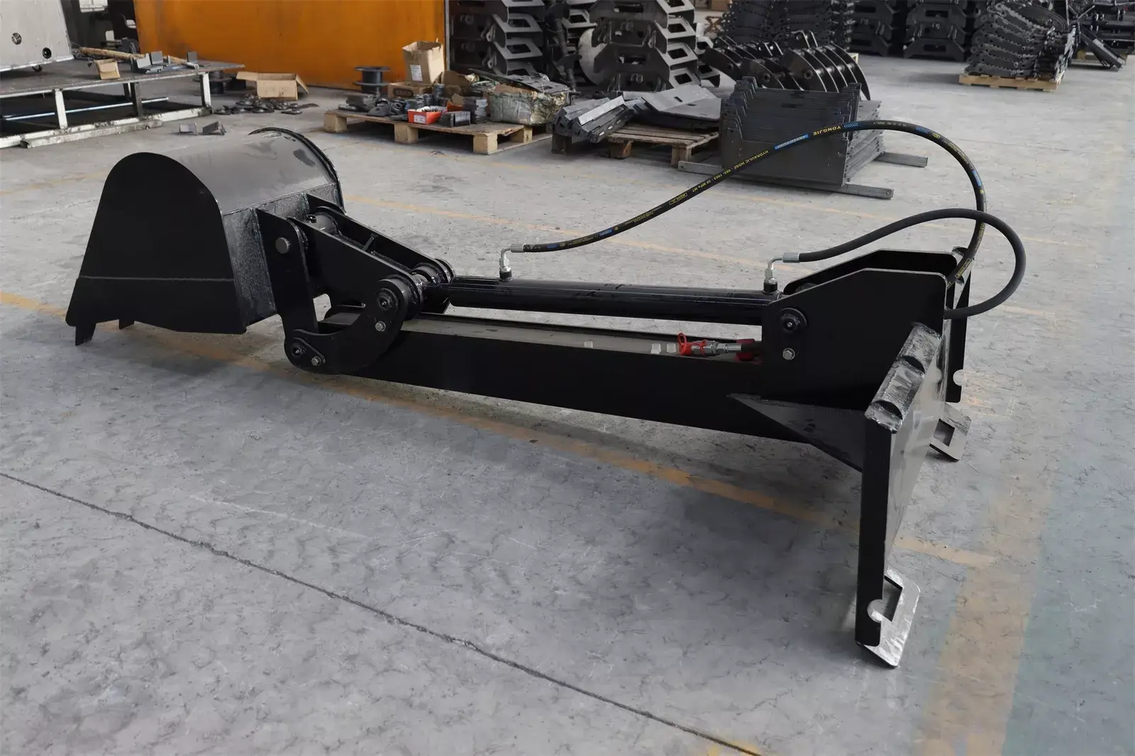 TYPHON STOMP Backhoe Attachment