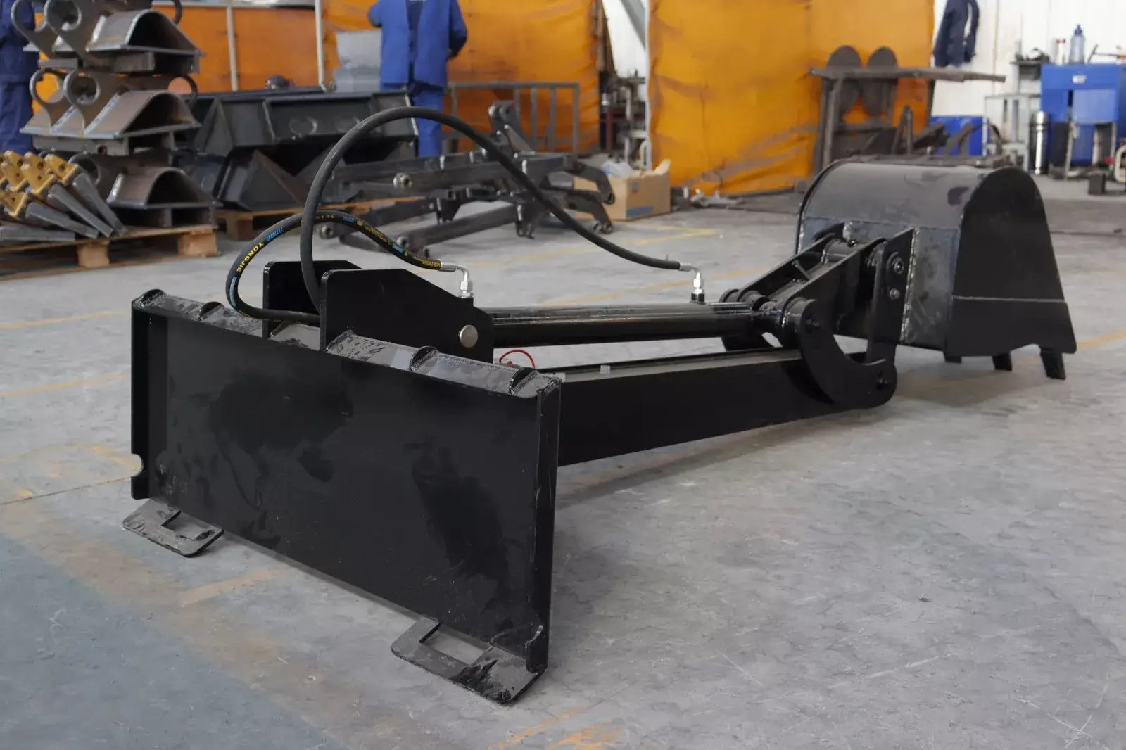 TYPHON STOMP Backhoe Attachment