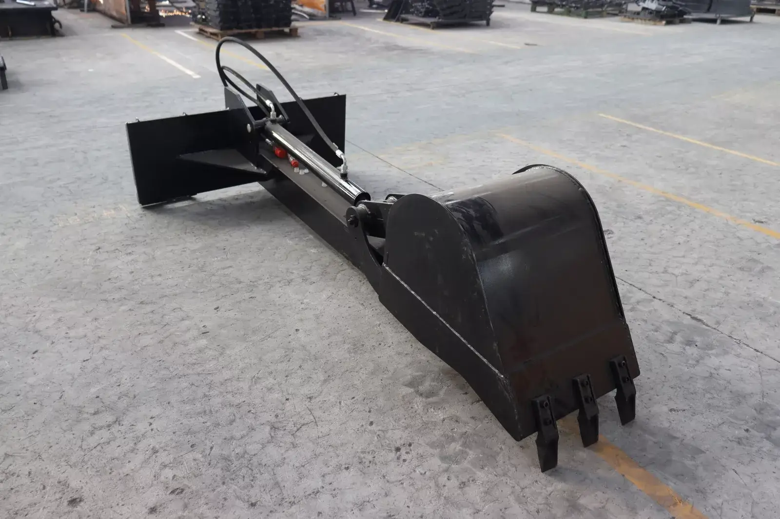 TYPHON STOMP Backhoe Attachment